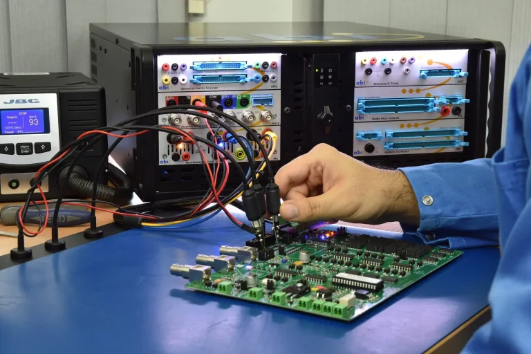 Technician testing a circuit board the through the MIS4 module on the BoardMaster